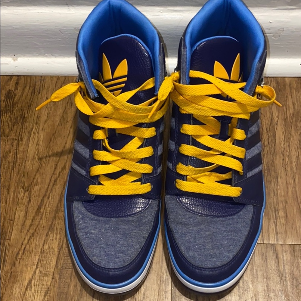 Blue and Yellow Striped Adidas with yellow strings